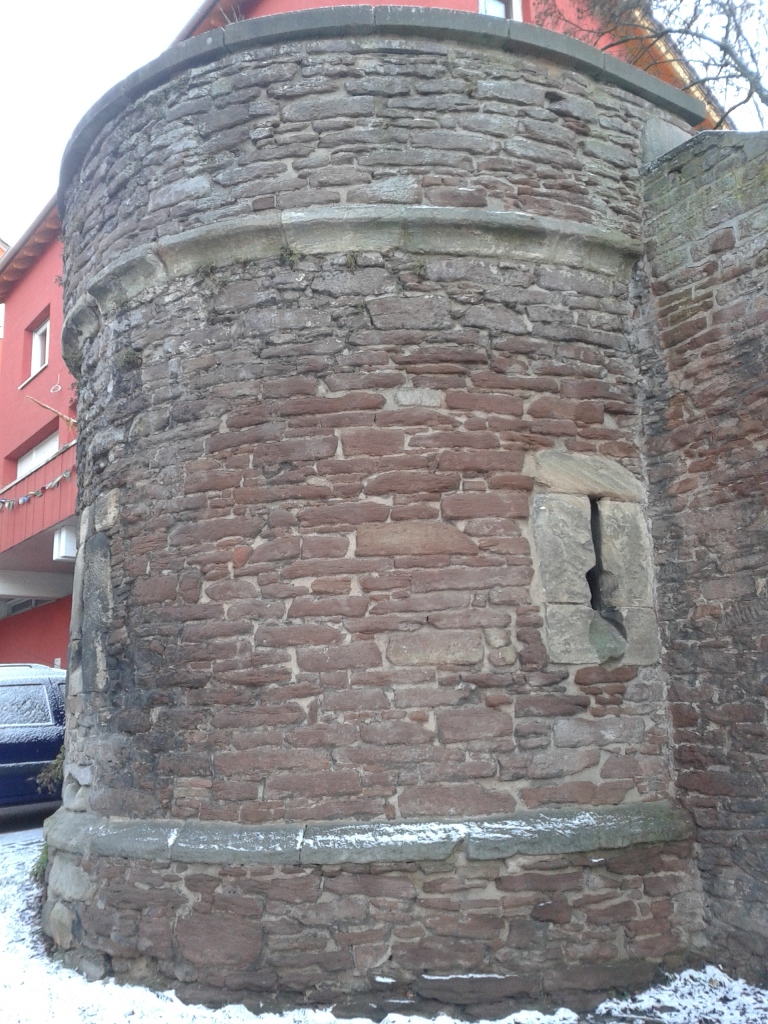 A medieval tower remained after the bombing of the castle.  It now is perched on the highstreet, between buildings from the 1950s and beyond.  A testament to the almost complete destruction of Boblingen's center. © Brandon Wilgus, 2015.