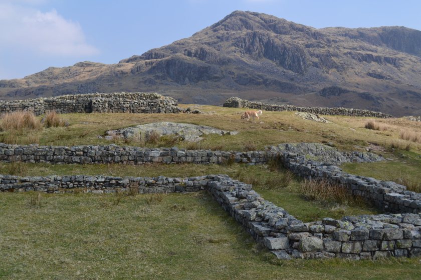 Hardknott Roman Fort, the Lake District, Cumbria. Hardknott peak is visible in the distance, and the Praetorium foundations are visible in the forground. © Brandon Wilgus, 2015.